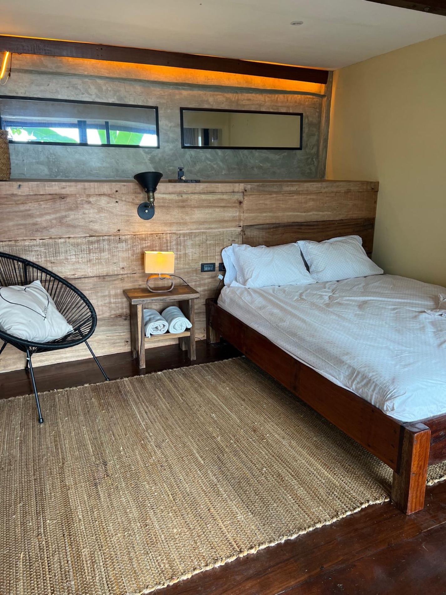 Warm timber bedroom with jute rug, La Señorita